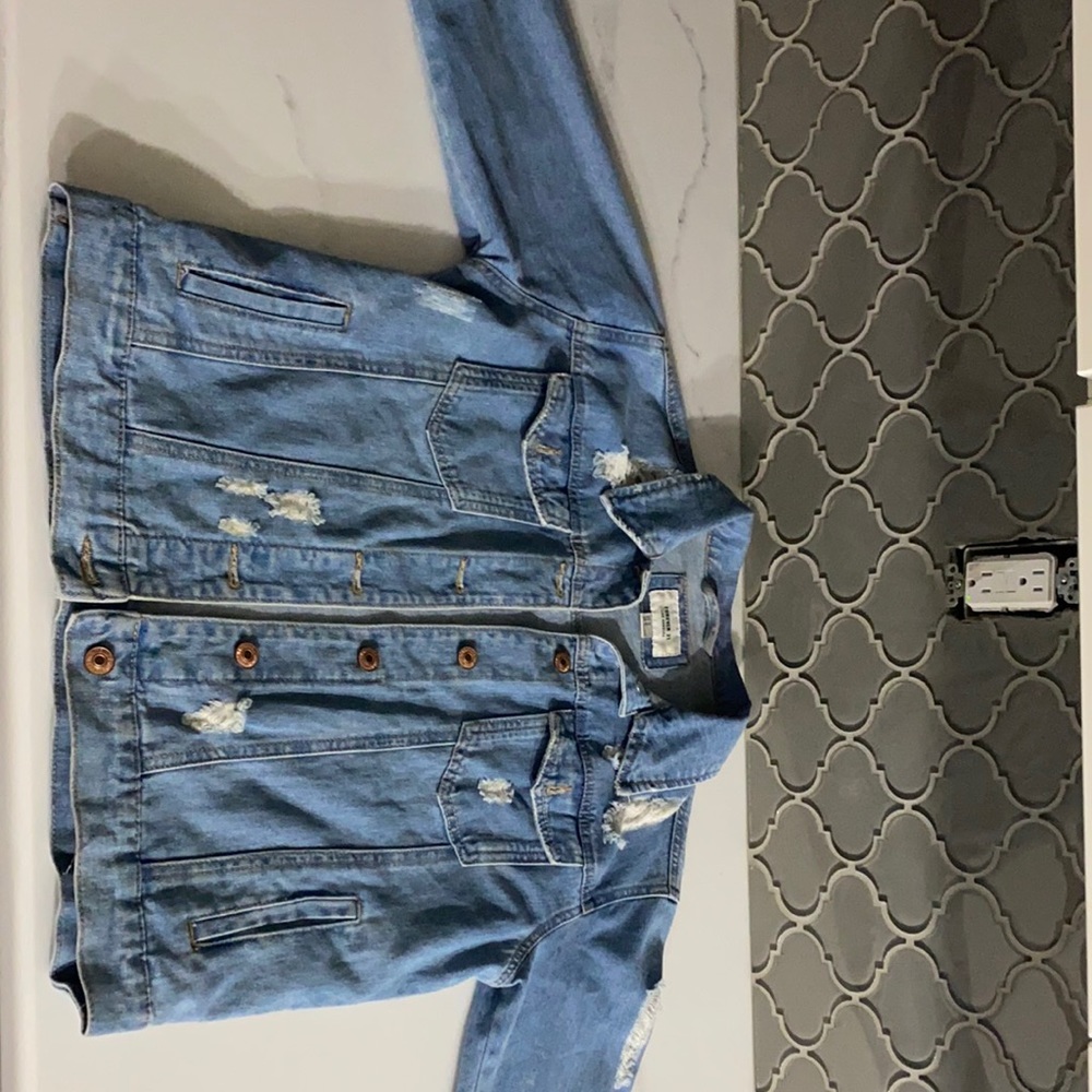 Ripped jean jacket